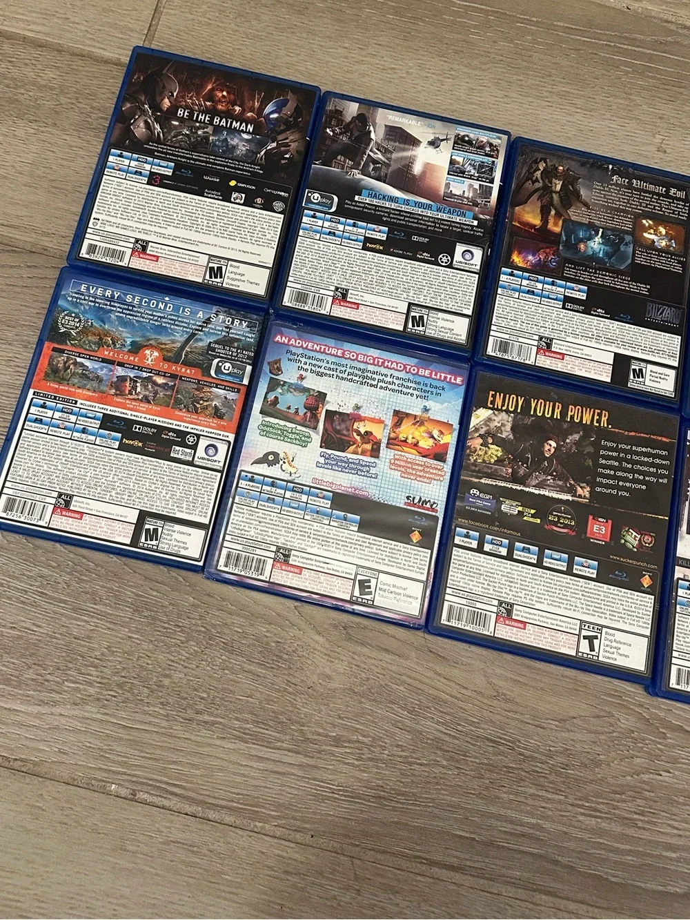 PlayStation 4 Video Games Lot (8) (Watch Dogs, Metro Redux, Batman, Far Cry 4)